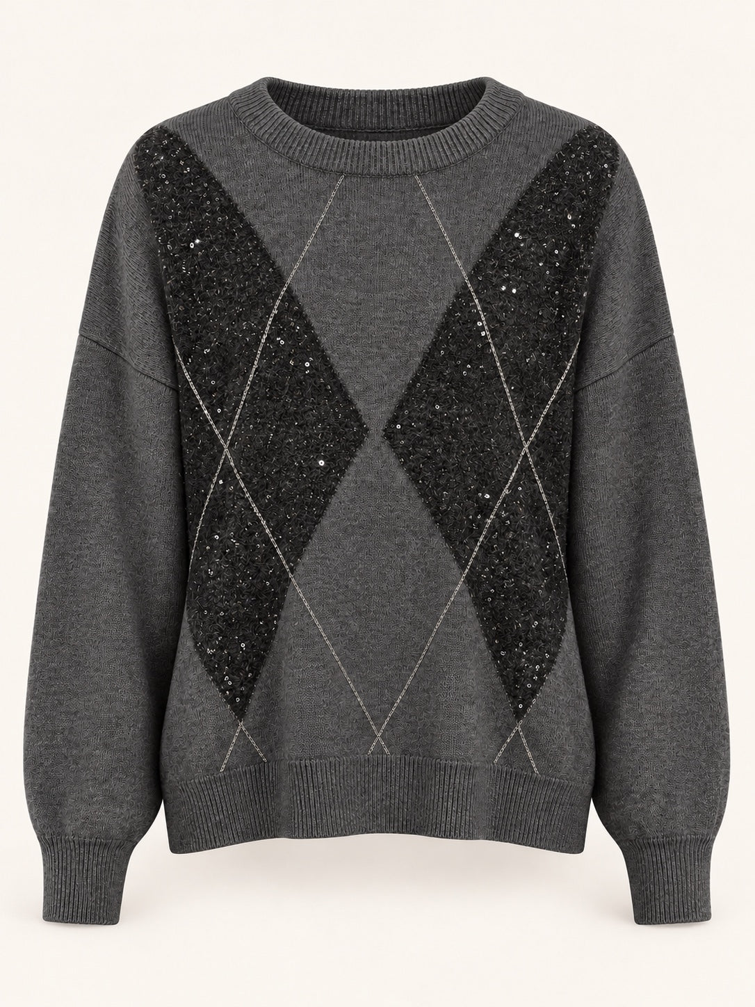 Jersey gris oscuro con rombos negros y lentejuelas, vista frontal